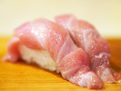 fatty fish on a wooden surface