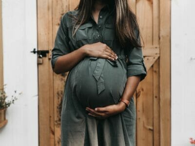 pregnant woman in a long dress