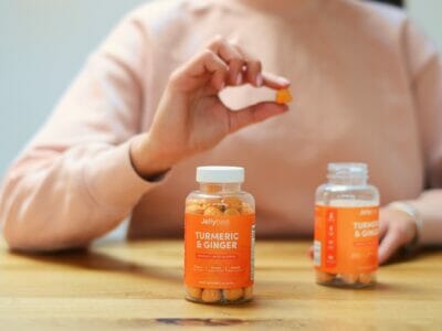 two vitamin bottles on a table