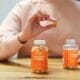 two vitamin bottles on a table