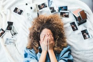 curly girl with photos 