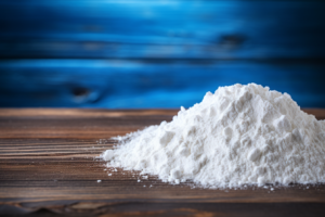 creatine powder on a wooden table 