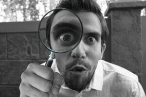 man with a magnifying glass