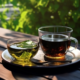 green and black tea in a transparent cups